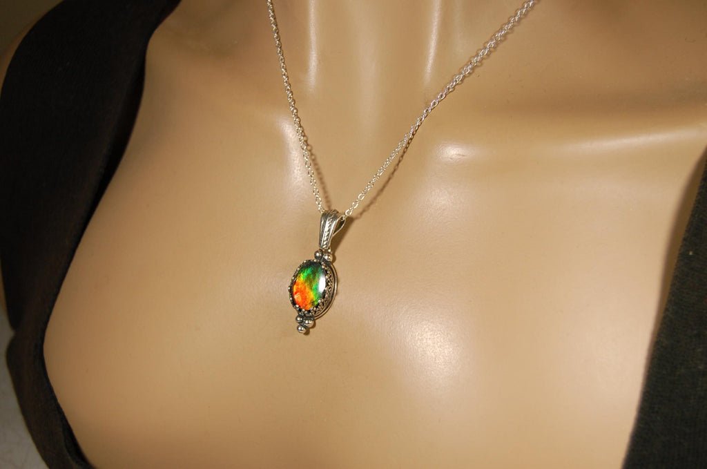 Ammolite pendant gift idea for wife..has four bright colors.041716