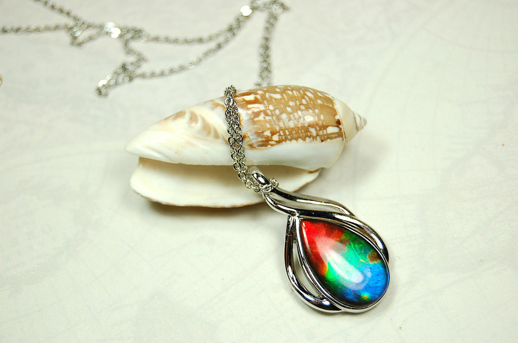 Ammolite JewelryPendant.High quality gem with brilliant colors will attract a lot of attention.#062825