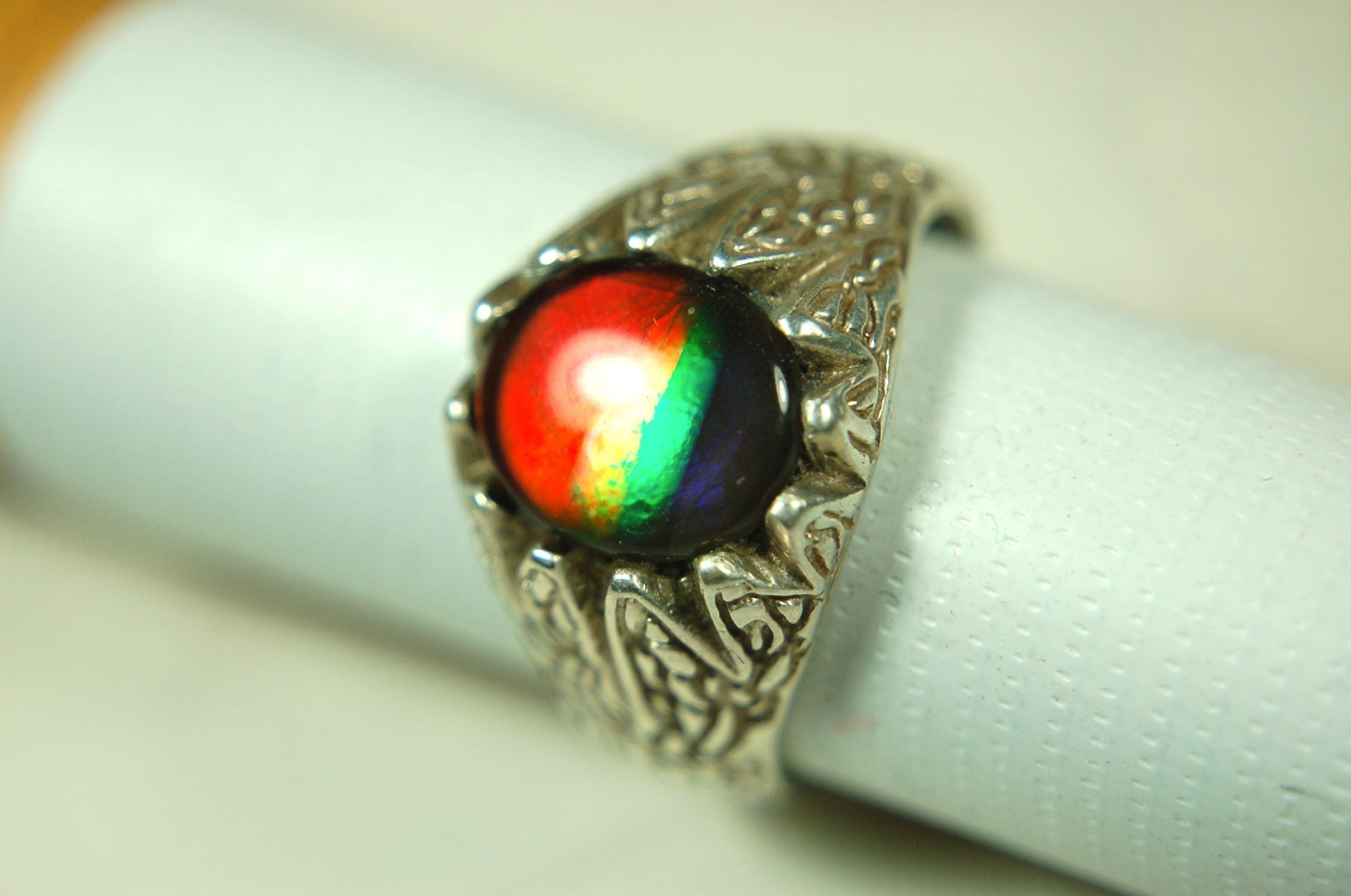 Ammolite Mens Ring of Four Colors.Size 11.Powerful Statement Ring in heavily carved Sterling Silver..061815