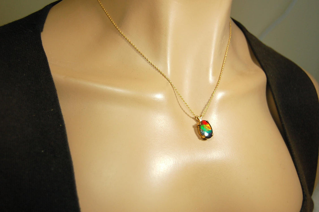Ammolite necklace pendant in solid 10k yellow gold.A gift your wife will treasure.Brilliant color changer. 071601