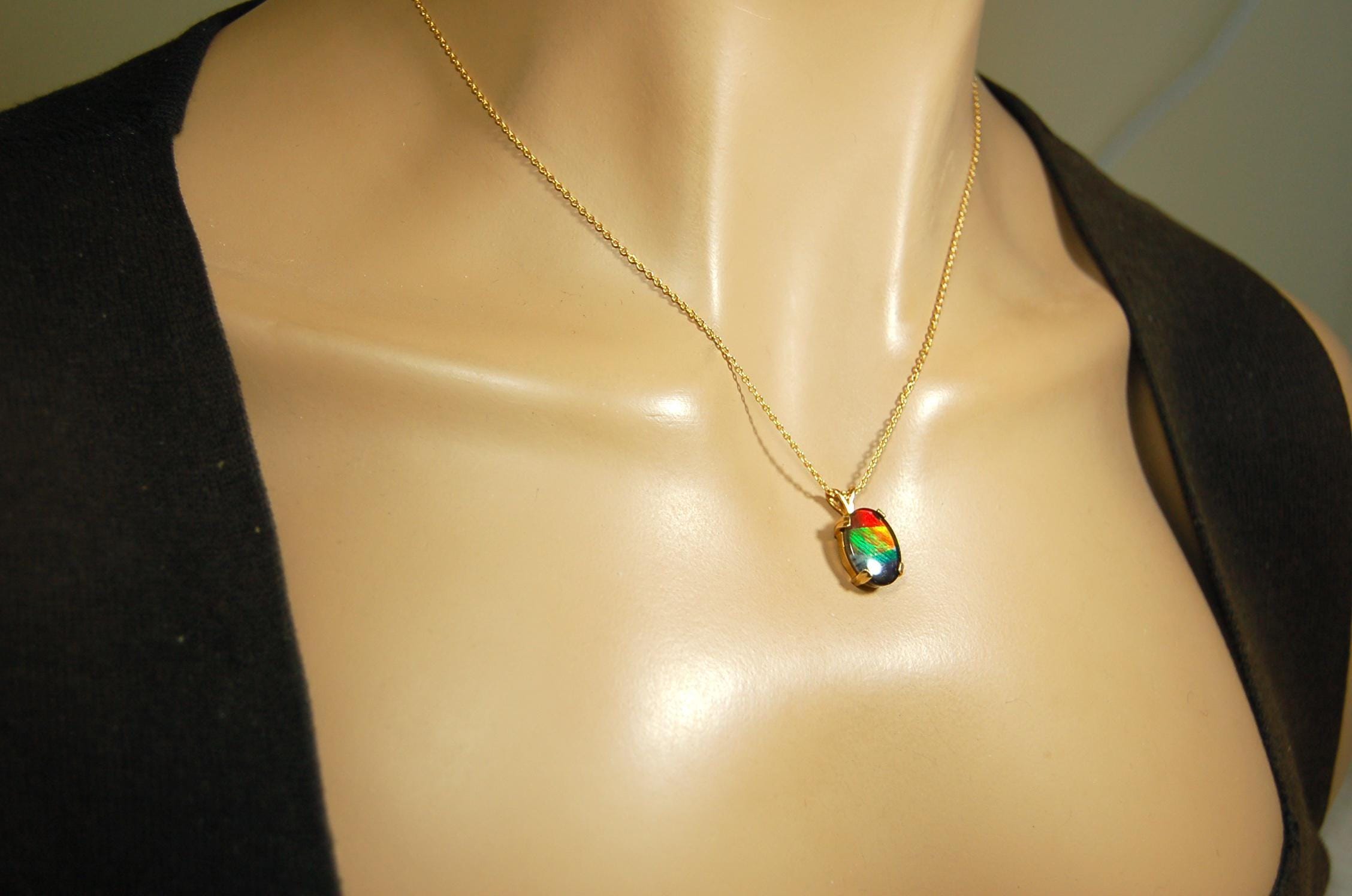 Ammolite necklace pendant in solid 10k yellow gold.A gift your wife will treasure.Brilliant color changer. 071601