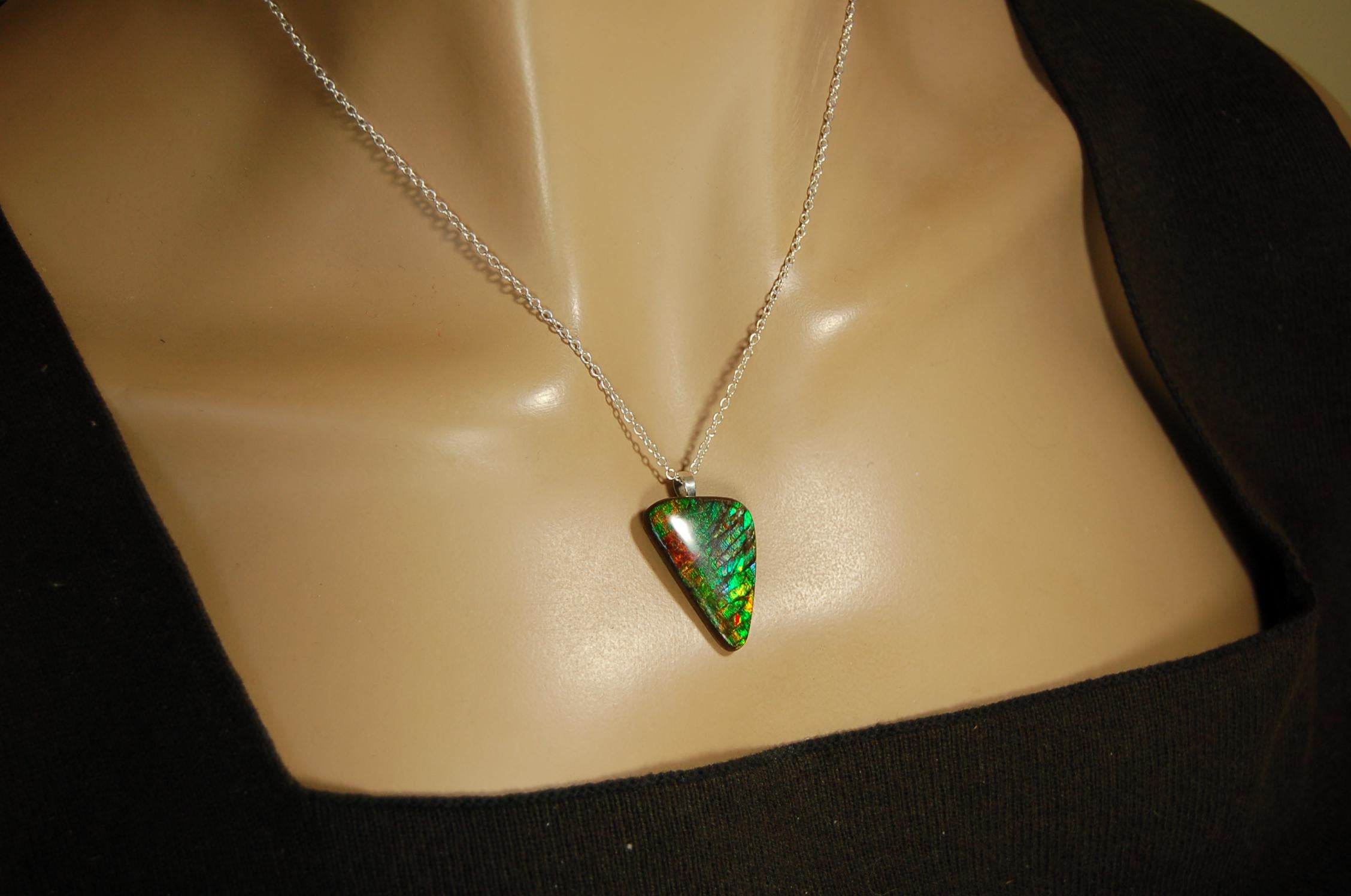Natural Ammolite Gemstone Pendant from Alberta Canada with bright rich varied colors. A perfect Unisex  birthday gift. 032416