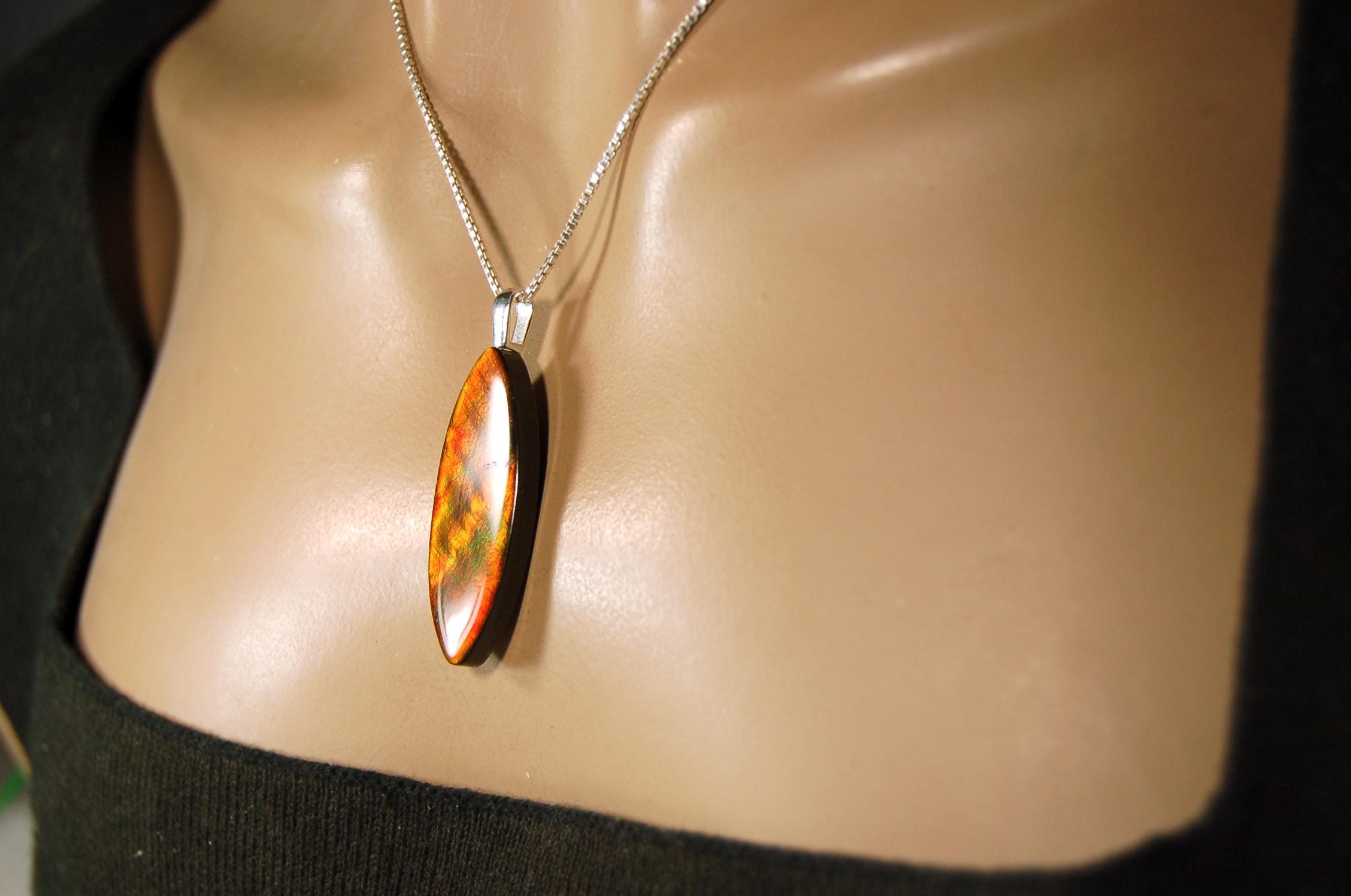 Ammolite Pendant.All natural free form cabochon set as minimalist and unisex jewelry.Rich red Jewelry.Gift idea for wife.Boho Jewelry.020815