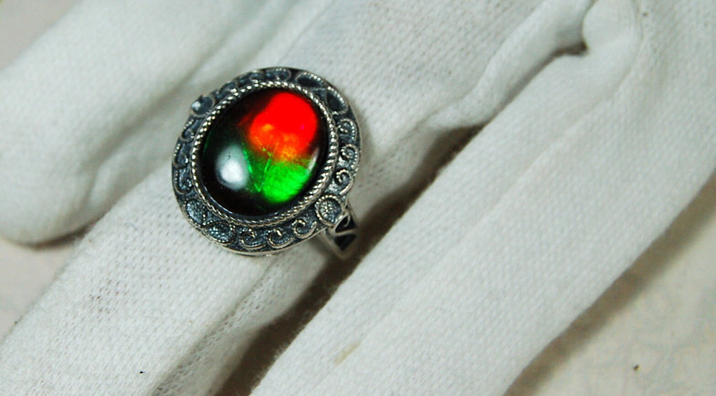 Ammolite Ring.Adjustable fit.Brilliant flashing colors.022219.