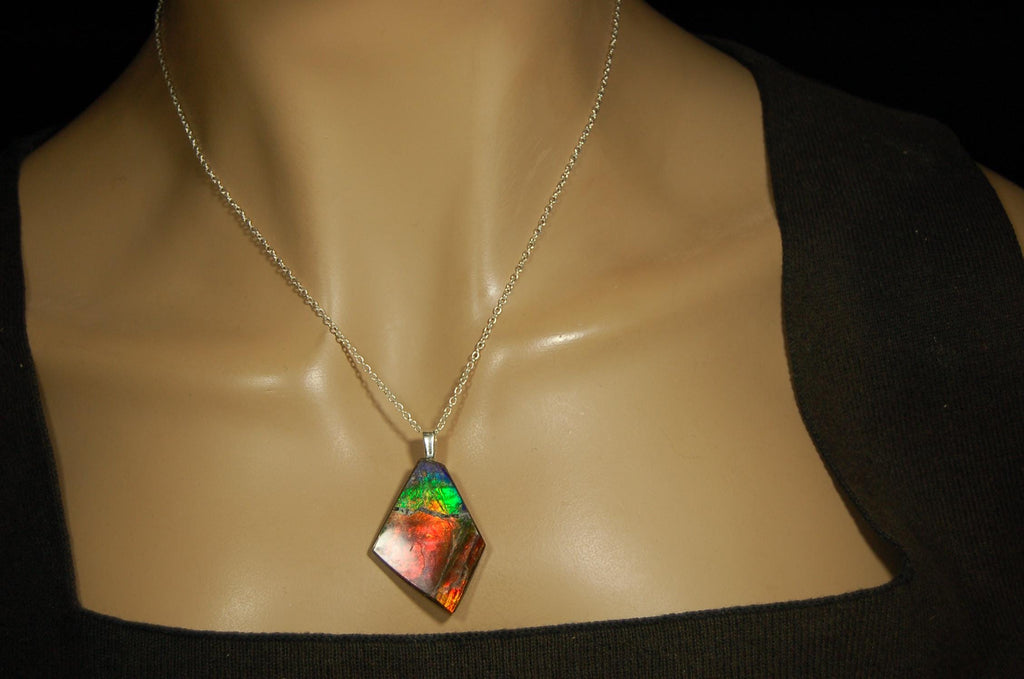 Ammolite pendant necklace.Unique raw natural cabochon with brilliant varied colors.Unisex design.Boho jewelry.031716
