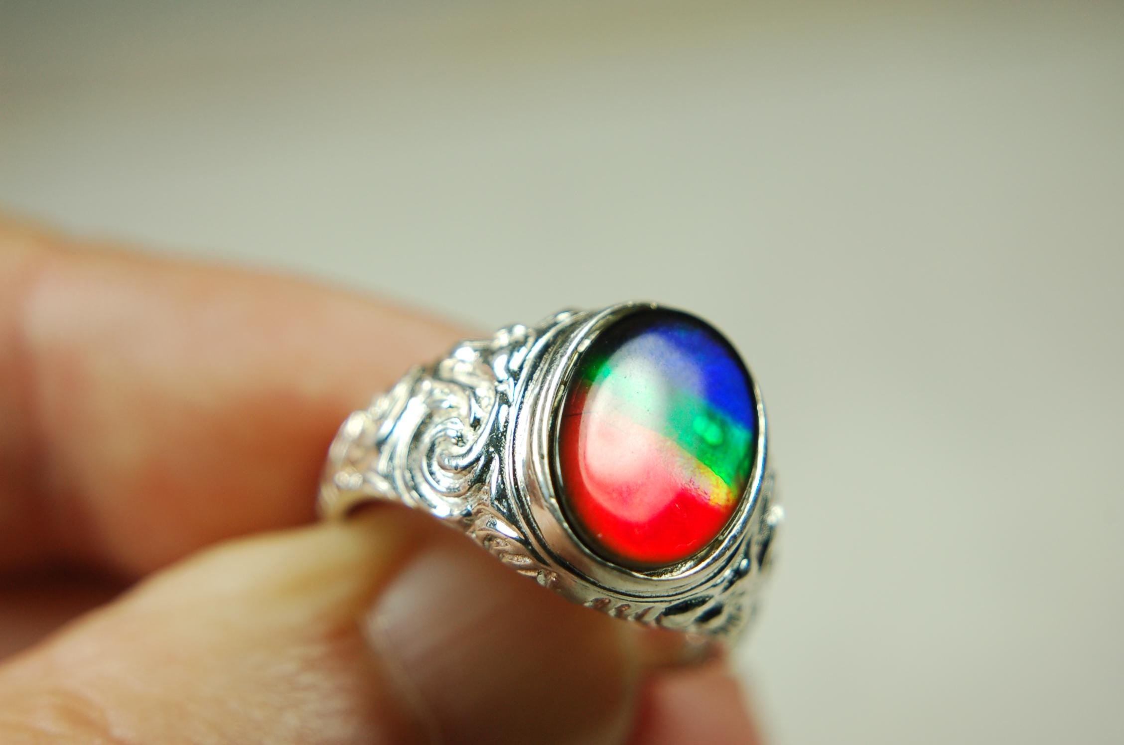 Ammolite Mens Ring set in sculptured sterling silver.Powerful bright tricolor gemstone in size 10.#70615
