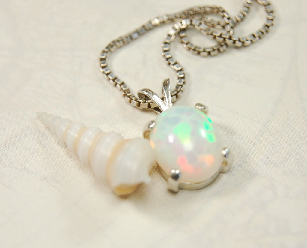 Opal pendant.Bright rolling colors. Desirable honeycomb gemstone.Perfect gift for her.MUST see colors in video.121213