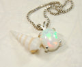 Opal pendant.Bright rolling colors. Desirable honeycomb gemstone.Perfect gift for her.MUST see colors in video.121213