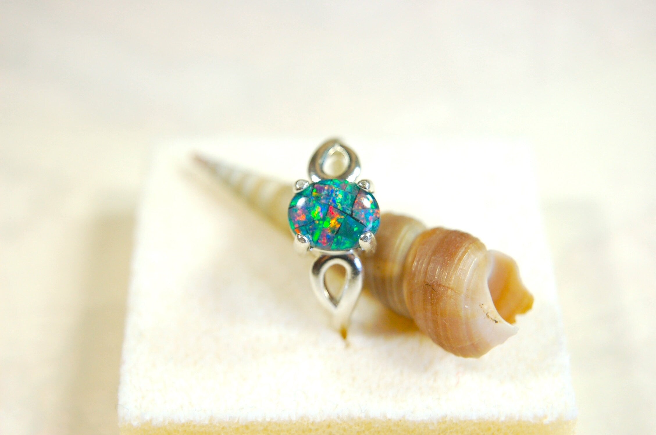 Australian Opal Ring.Gorgeous colors. Set in Sterling Silver.The perfect gift.Size 7 Boho style.