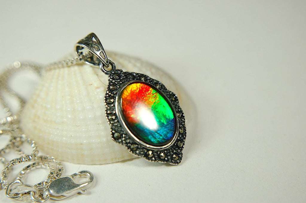 Ammolite jewelry pendant-a wifes birthgay gift Idea she will treasure.Genuine high quality ammolite mined and shipped from Canada.013115