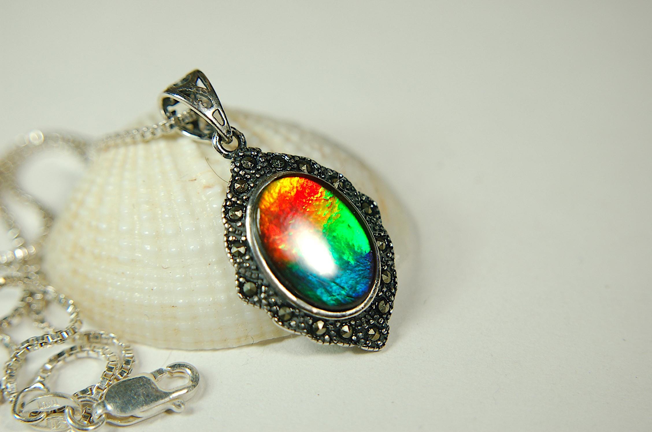 Ammolite jewelry pendant-a wifes birthgay gift Idea she will treasure.Genuine high quality ammolite mined and shipped from Canada.013115