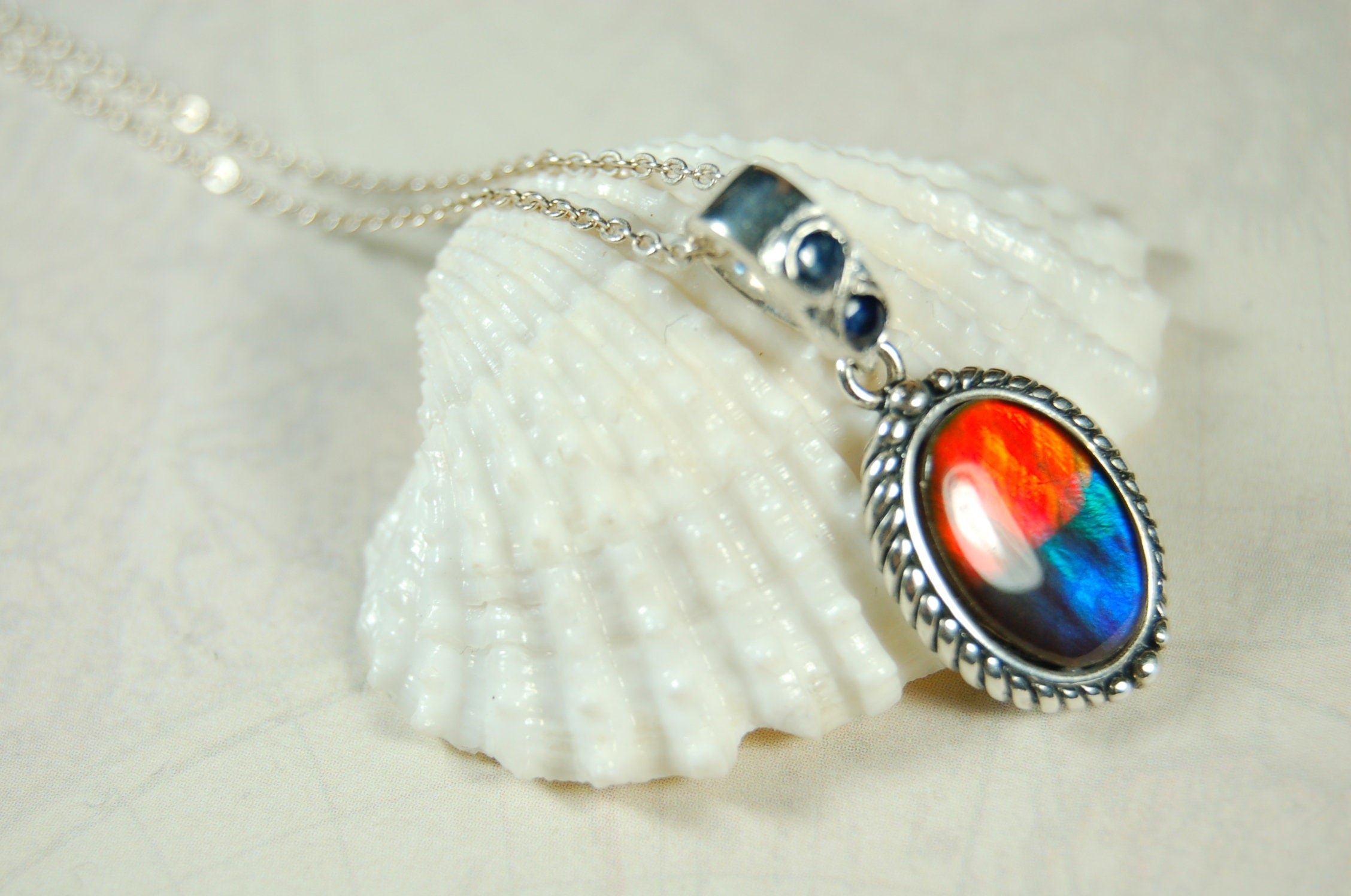 Ammolite Pendant Necklace.Solid sterling silver setting.Bright Rainbow colors. Sapphire studded bail.Unique gift for wife.102429