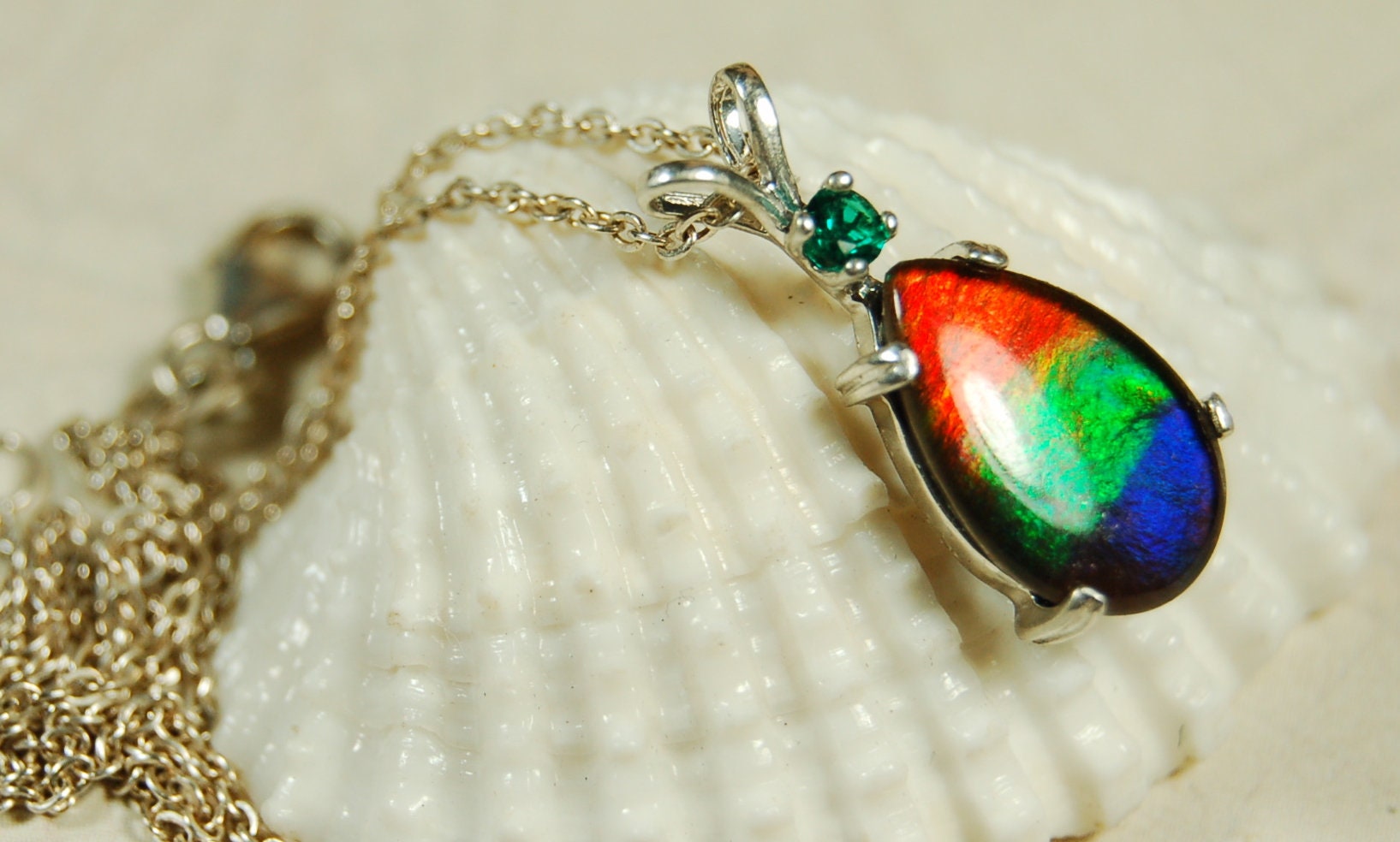 Ammolite Jewelry Pendant.bright Rainbow Colors. Ammolite with Emerald.Canadian gemstones.The perfect RARE gift for her.#012410