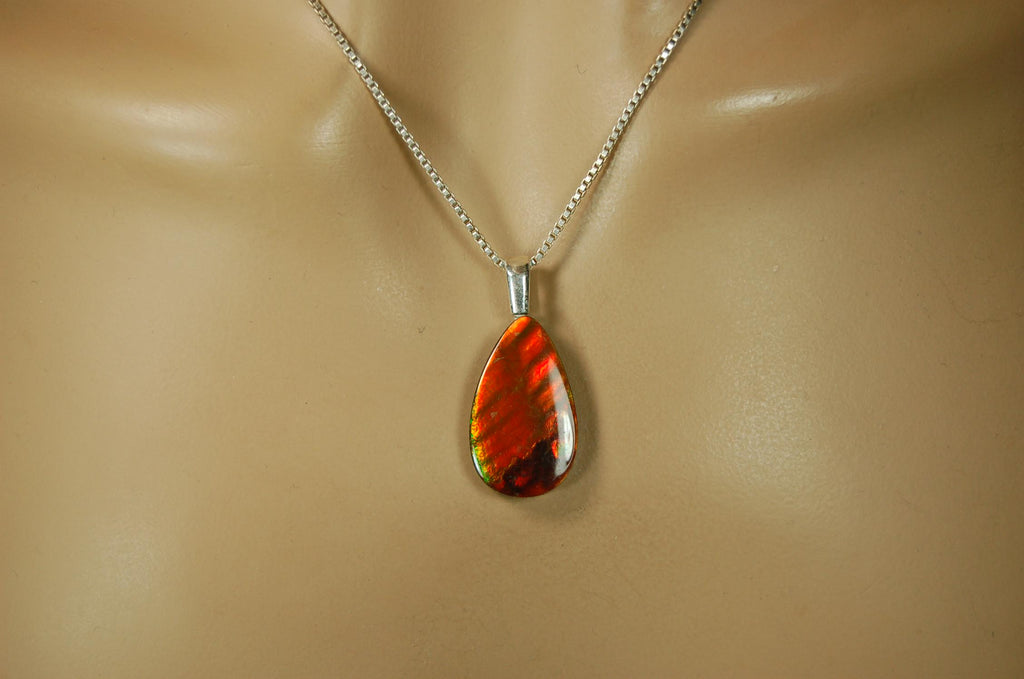 Anniversary gift idea.Unisex Jewelry.Ammolite Pendant Necklace, Sterling Silver Feather Bail. Color changing natural freeform cabochon.