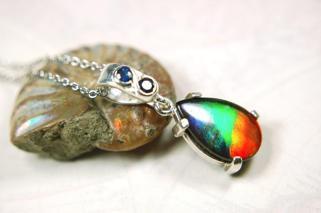 Ammolite Pendant Necklace.Sapphire studded bail.Brilliant rainbow colors.Sterling silver set.RARE gift for her.071115