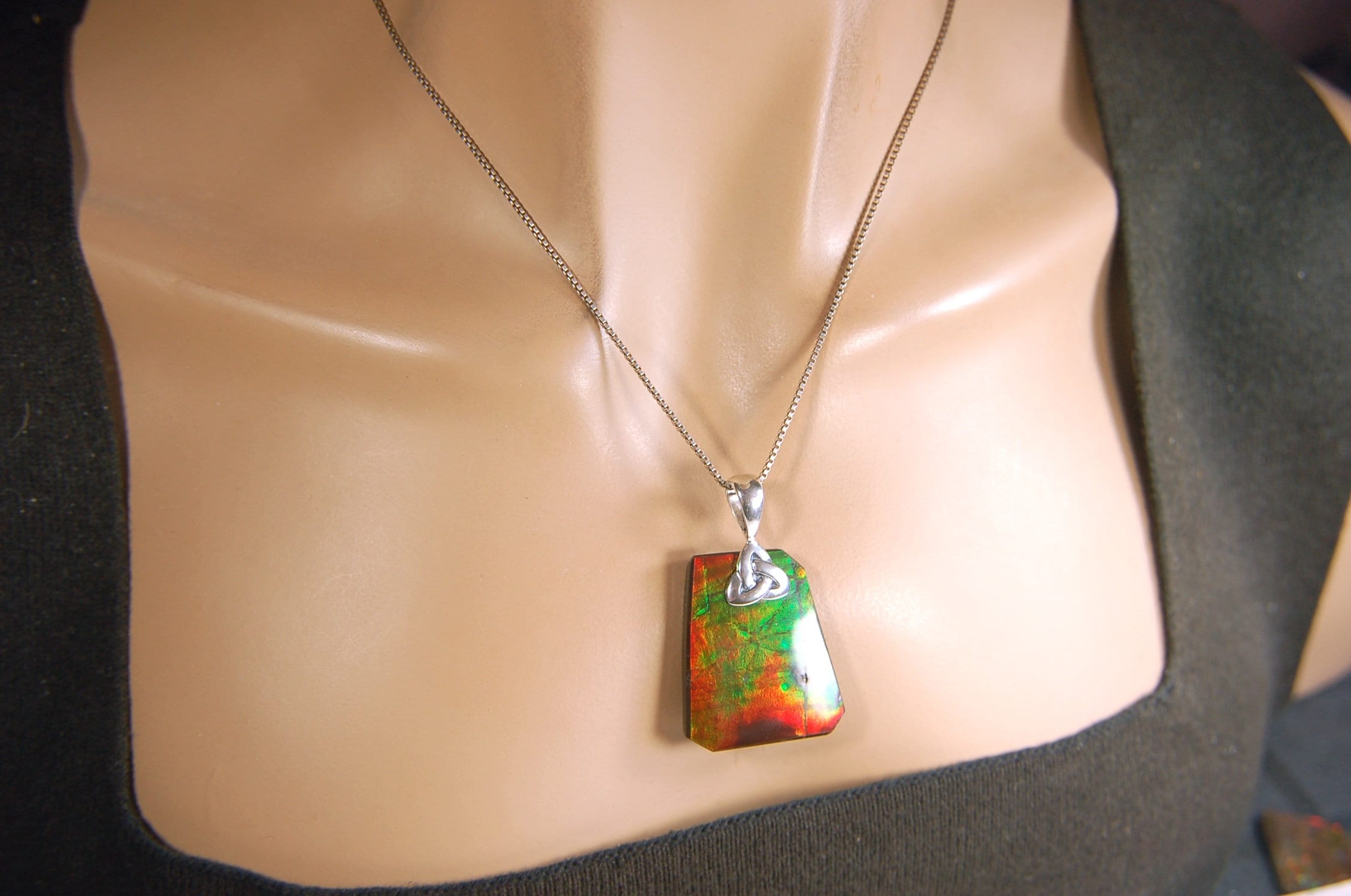 Natural Ammolite Cabochon Pendant necklace with deep rich colors.Heavy sterling silver Celtic Bail.Gift for wife? Must see video.032514