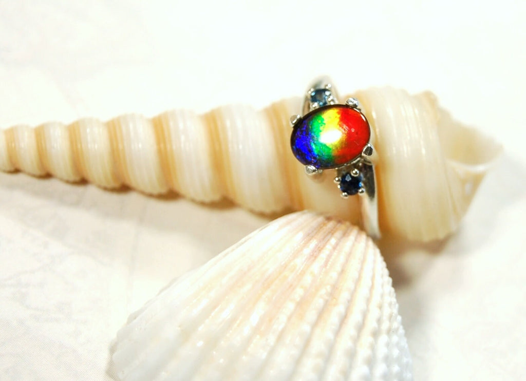 Ammolite Ring with Sapphire side stones.Lovely four color gem.Size 7.-#040314
