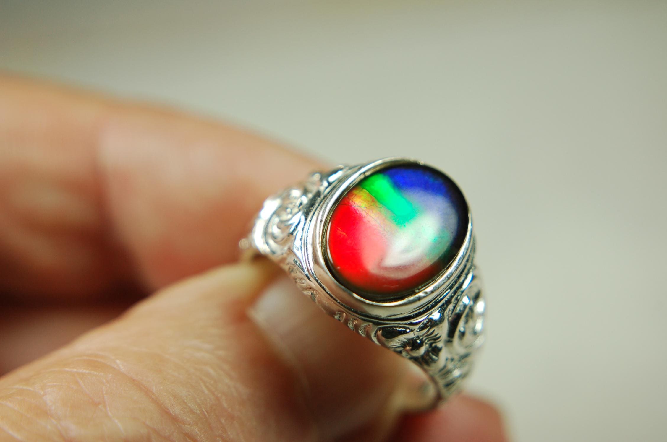 Ammolite Mens Ring set in sculptured sterling silver.Powerful bright tricolor gemstone in size 10.#70615
