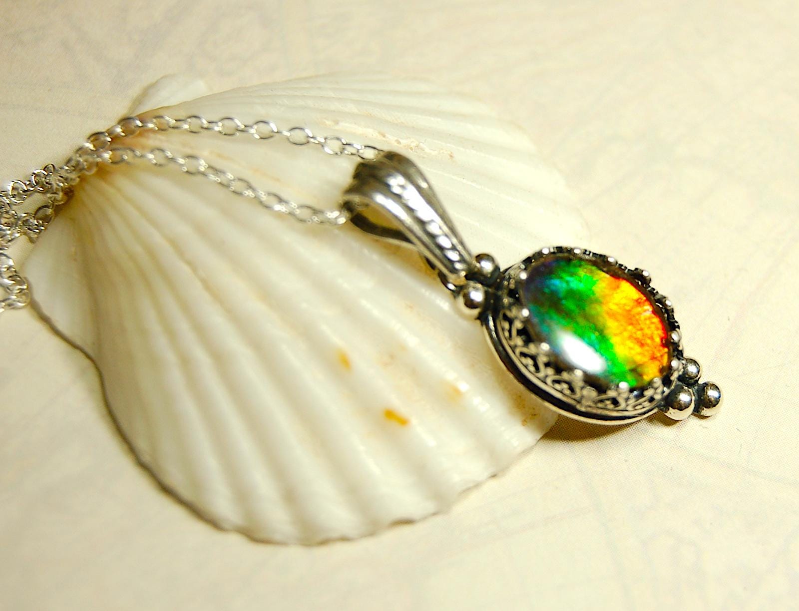 Ammolite pendant gift idea for wife..has four bright colors.041716