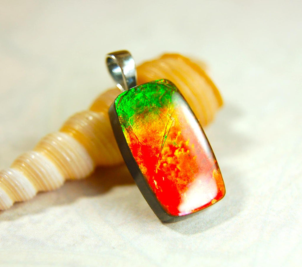 Unisex Ammolite Pendant Necklace.Genuine natural gemstone from Alberta. Perfect Gift idea..091514