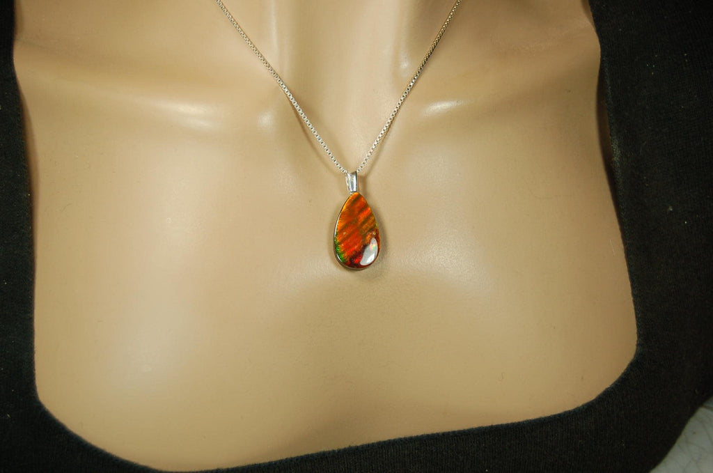 Anniversary gift idea.Unisex Jewelry.Ammolite Pendant Necklace, Sterling Silver Feather Bail. Color changing natural freeform cabochon.