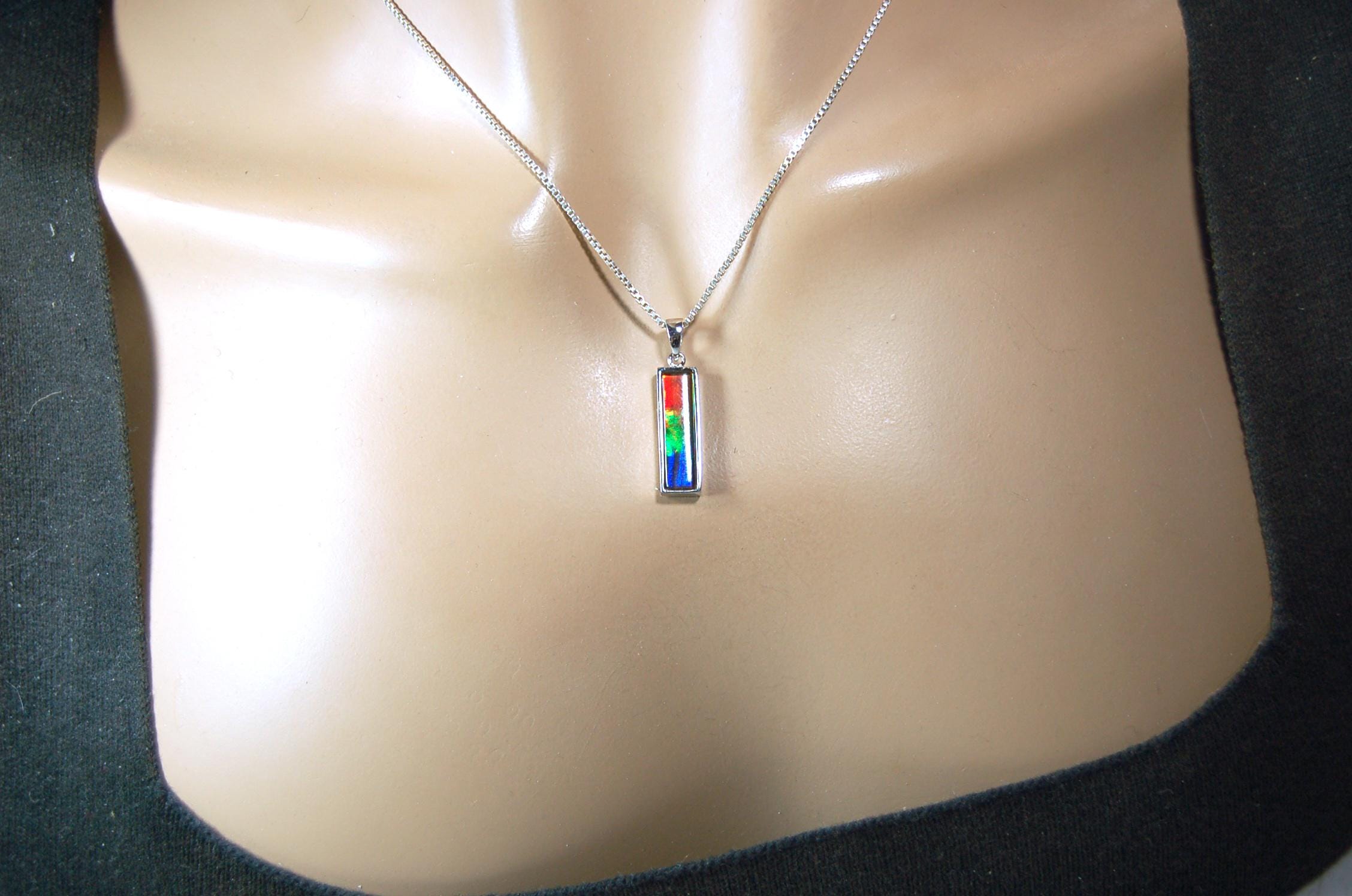 Ammolite.Striking Pendant.A Column Rich Rainbow colors.High quality Ammolite from Alberta Canada.Perfect gift for wife.050815