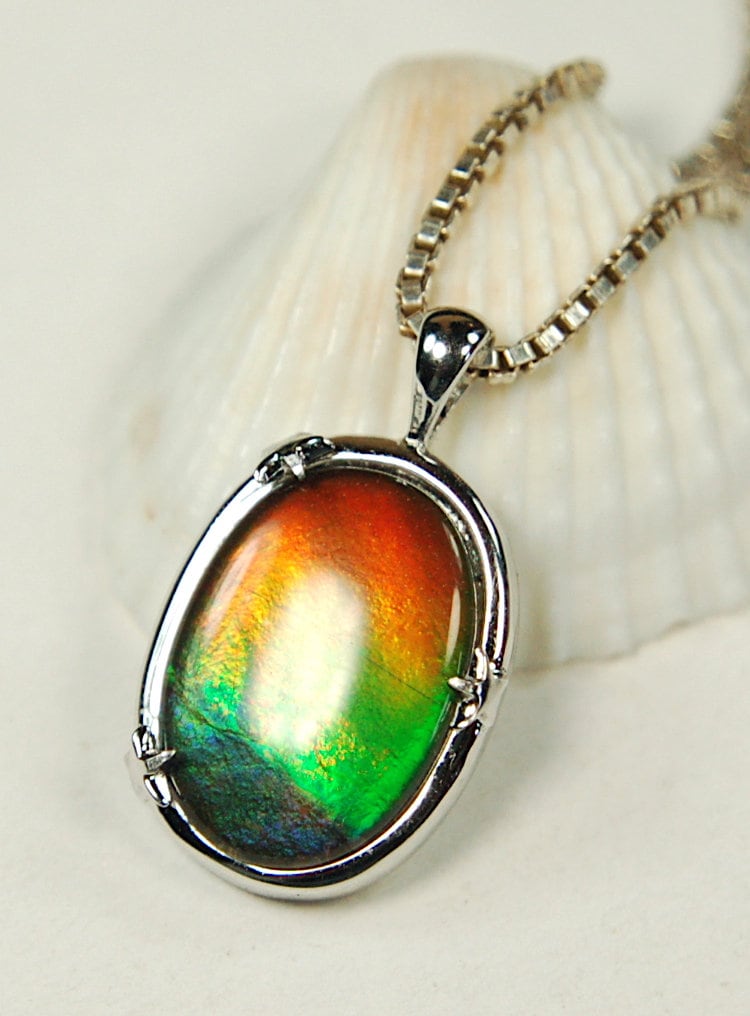 Ammolite Jewelry pendant with lovely rich colors that amaze.Canadian ammolite.Ammolite jewelry at its best.Ammolite from Canada.#051012