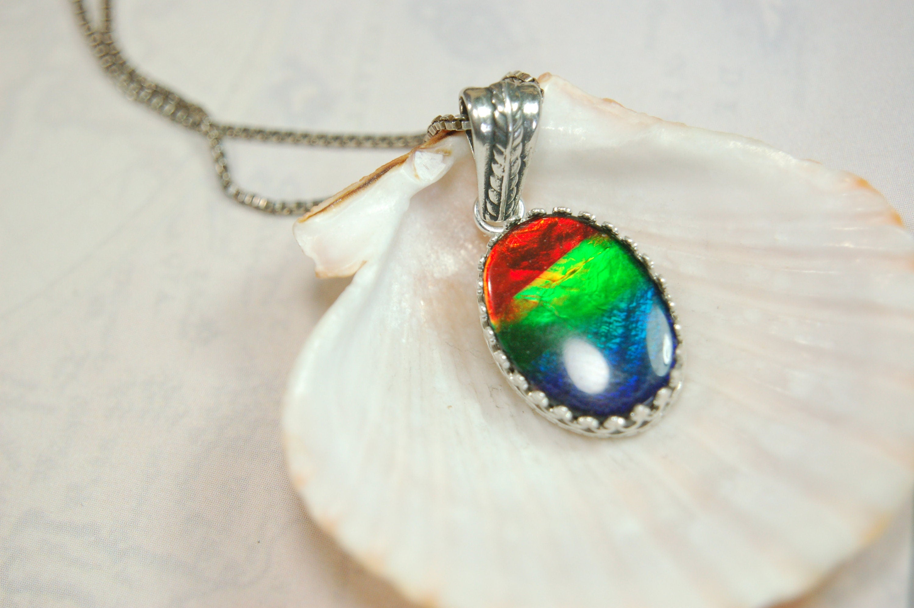 Colorful ammolite pendant - a one-of-a-kind addition to your collection or a perfect gift for someone special"021224