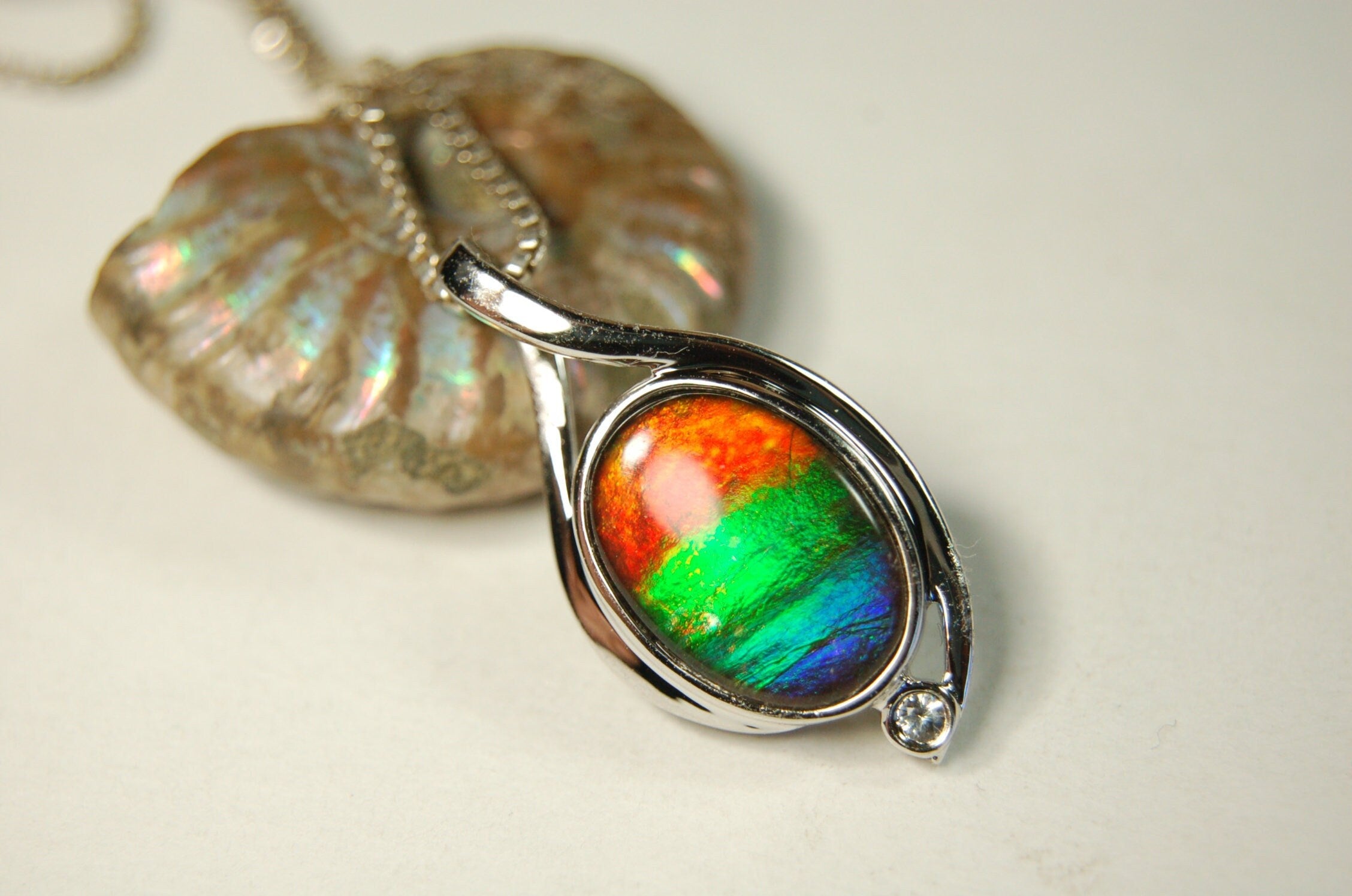 Ammolite Jewelry Pendant.Strong colors.Quality sterling Allergy free silver setting.Shipped free.071612