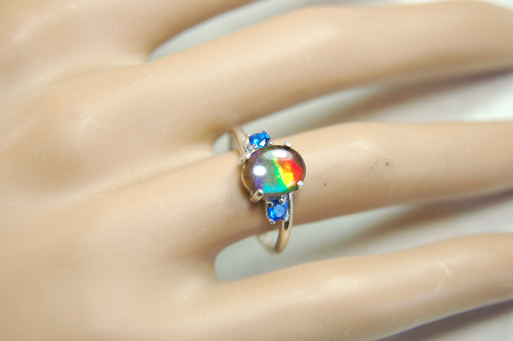 Ammolite Ring with brilliant Spinel side stones.Size 7.