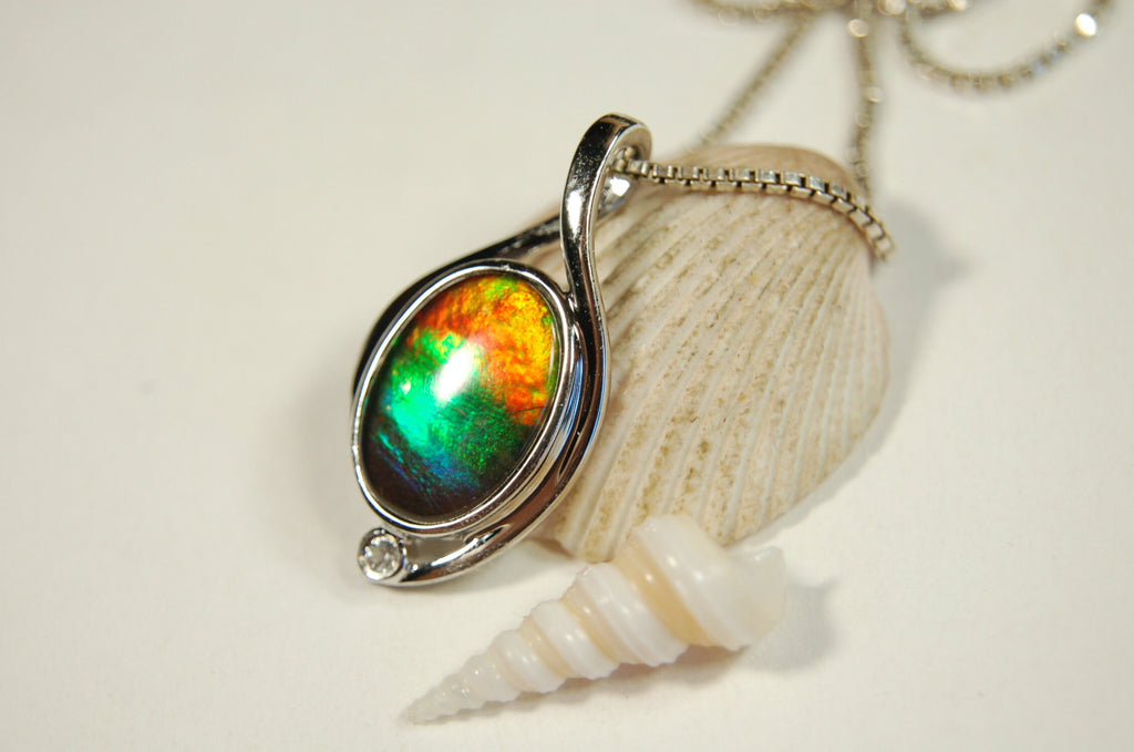Ammolite Jewelry Pendant.Strong colors.Quality sterling Allergy free silver setting.Shipped free.071612
