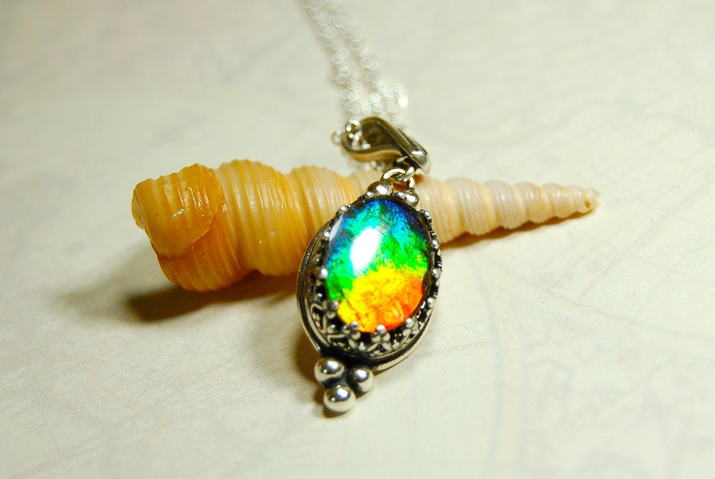 Ammolite pendant gift idea for wife..has four bright colors.041716