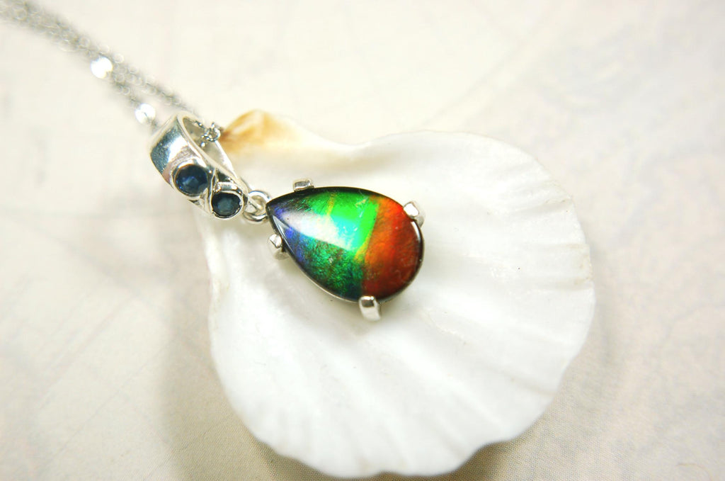 Ammolite Pendant Necklace.Sapphire studded bail.Brilliant rainbow colors.Sterling silver set.RARE gift for her.071115