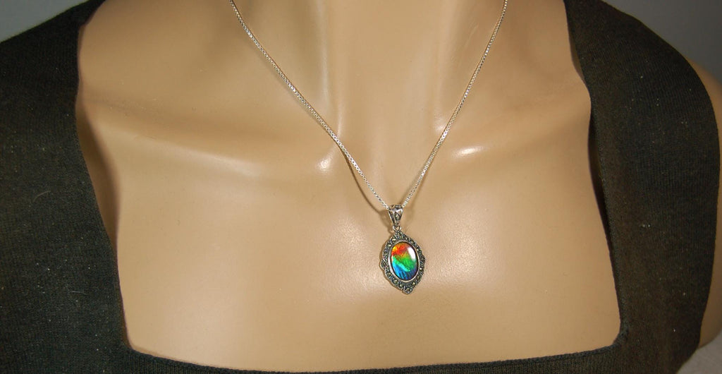 Ammolite jewelry pendant-a wifes birthgay gift Idea she will treasure.Genuine high quality ammolite mined and shipped from Canada.013115