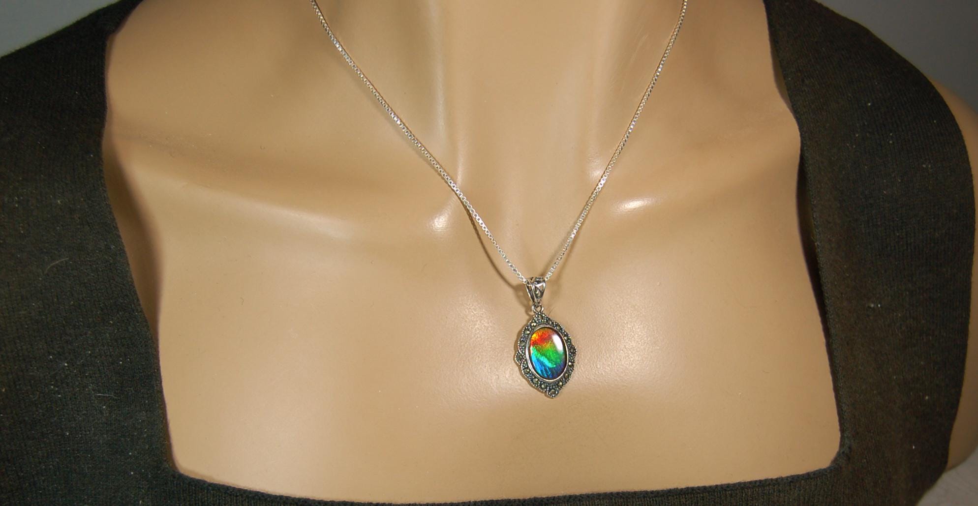 Ammolite jewelry pendant-a wifes birthgay gift Idea she will treasure.Genuine high quality ammolite mined and shipped from Canada.013115