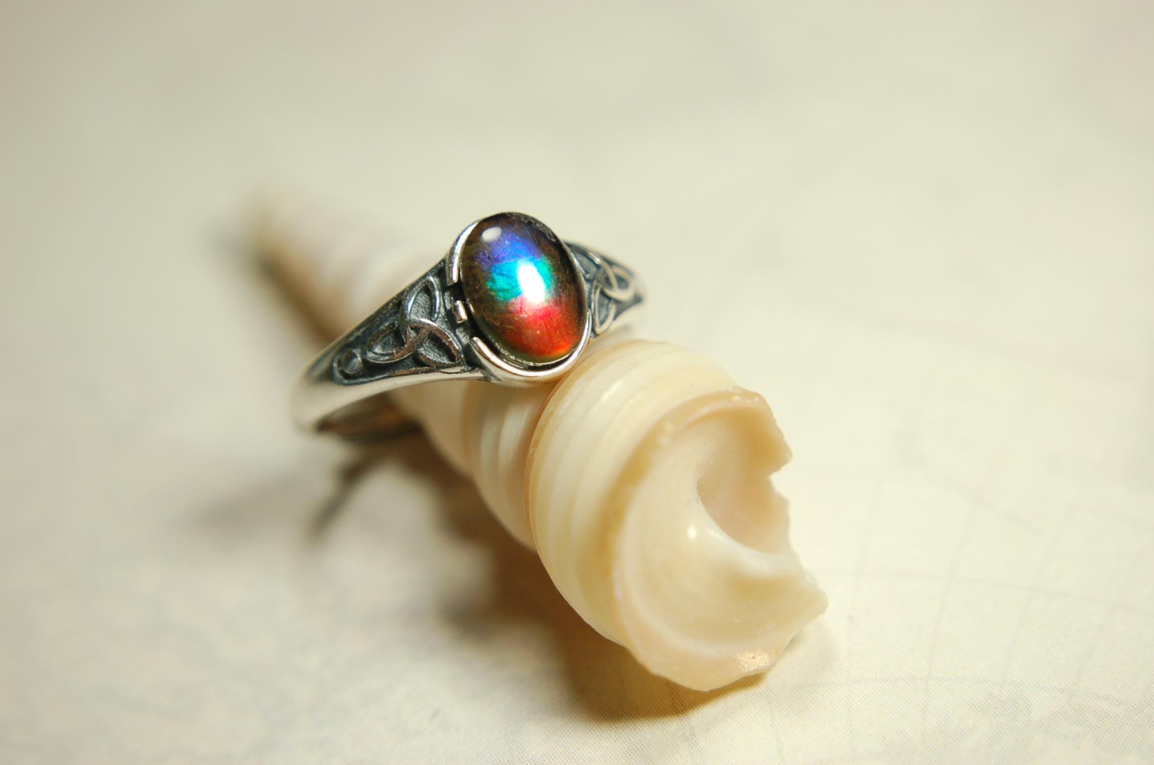 Ammolite Ladies Ring.Sterling Silver.Very feminine, has Celtic design and is in your size too!Brilliant tricolor gem.Gift for her?030816