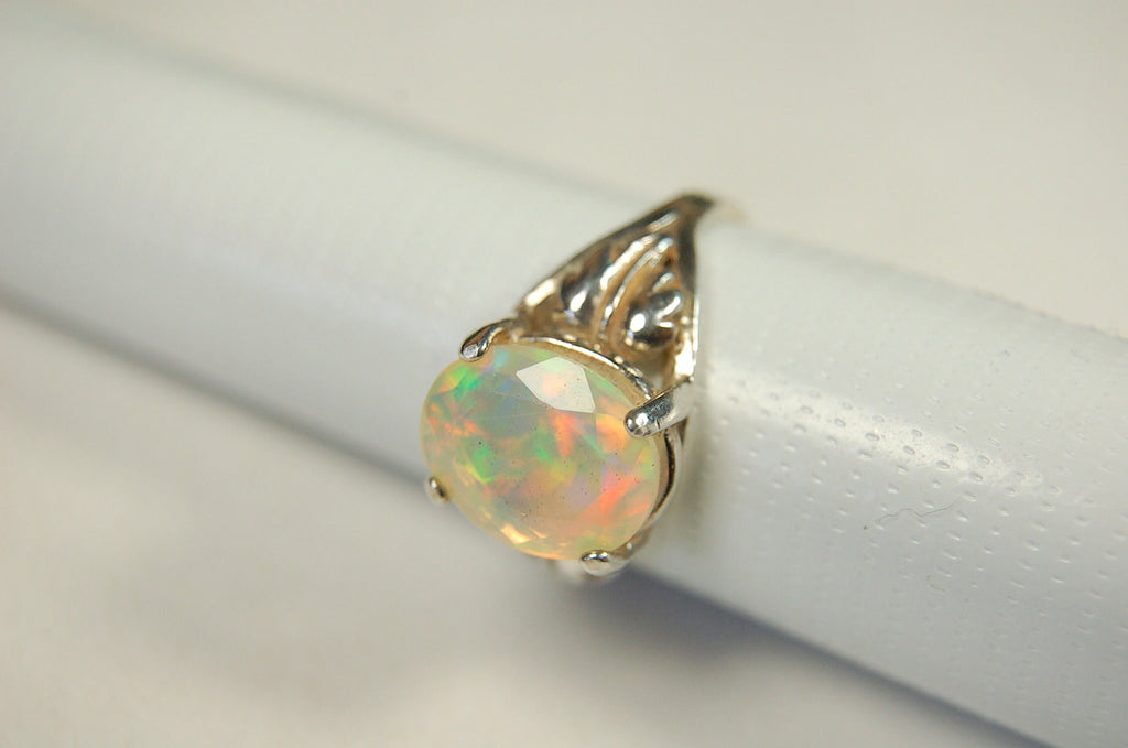 Opal ring.Bright Faceted Natural gem.Lovely flashing colors.#102612