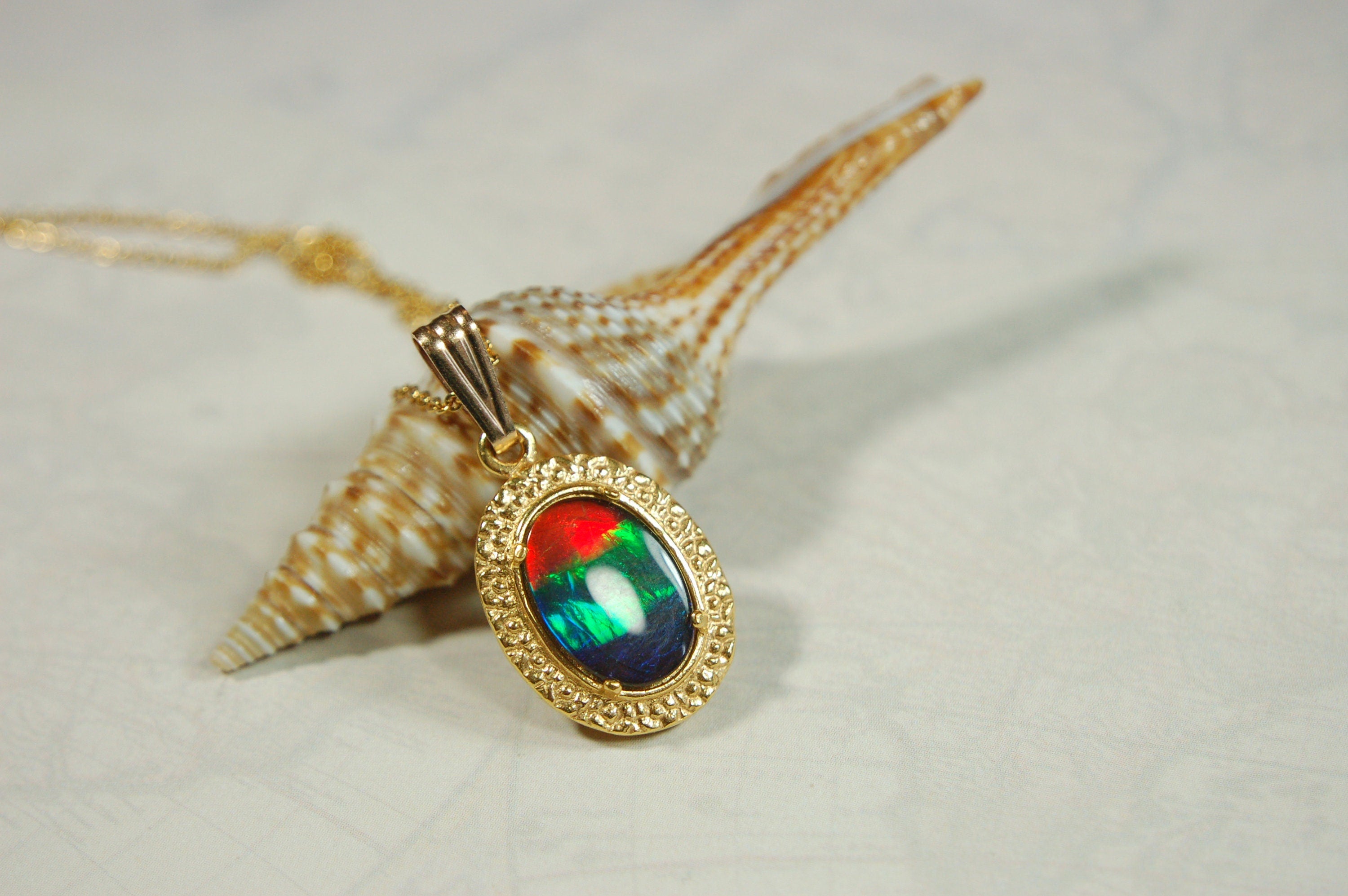 Ammolite.Gorgeous Alberta Ammolite Pendant in 14k Gold filled.The perfect birthday/anniversary gift for her.010424