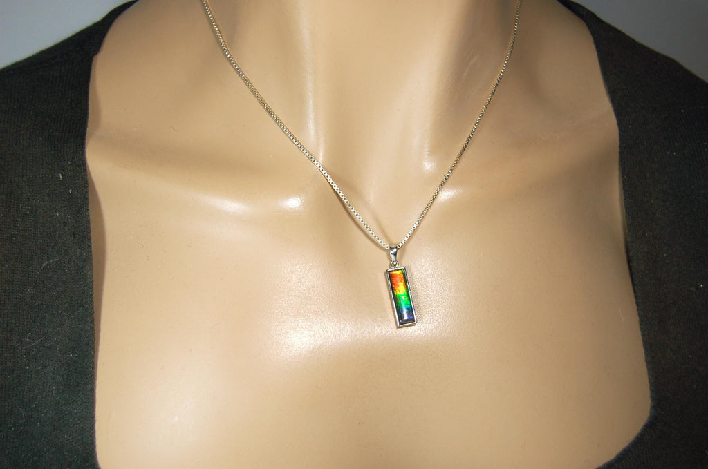 Lovely Ammolite pendant - the perfect gift for someone special.Sterling Silver plated with Rhodium so allergy free.052415