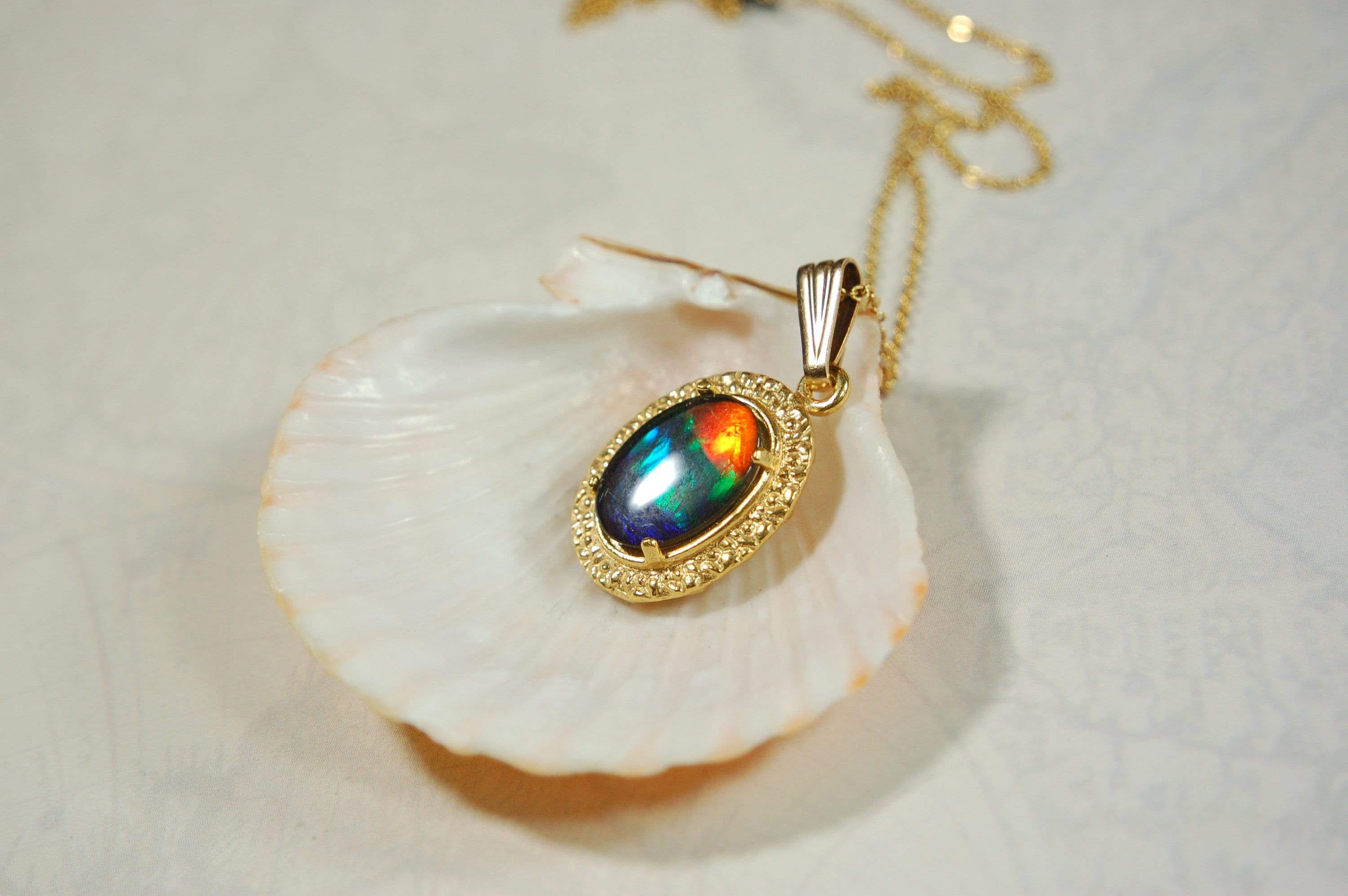 Ammolite.Gorgeous Alberta Ammolite Pendant in 14k Gold filled.The perfect birthday/anniversary gift for her.010424