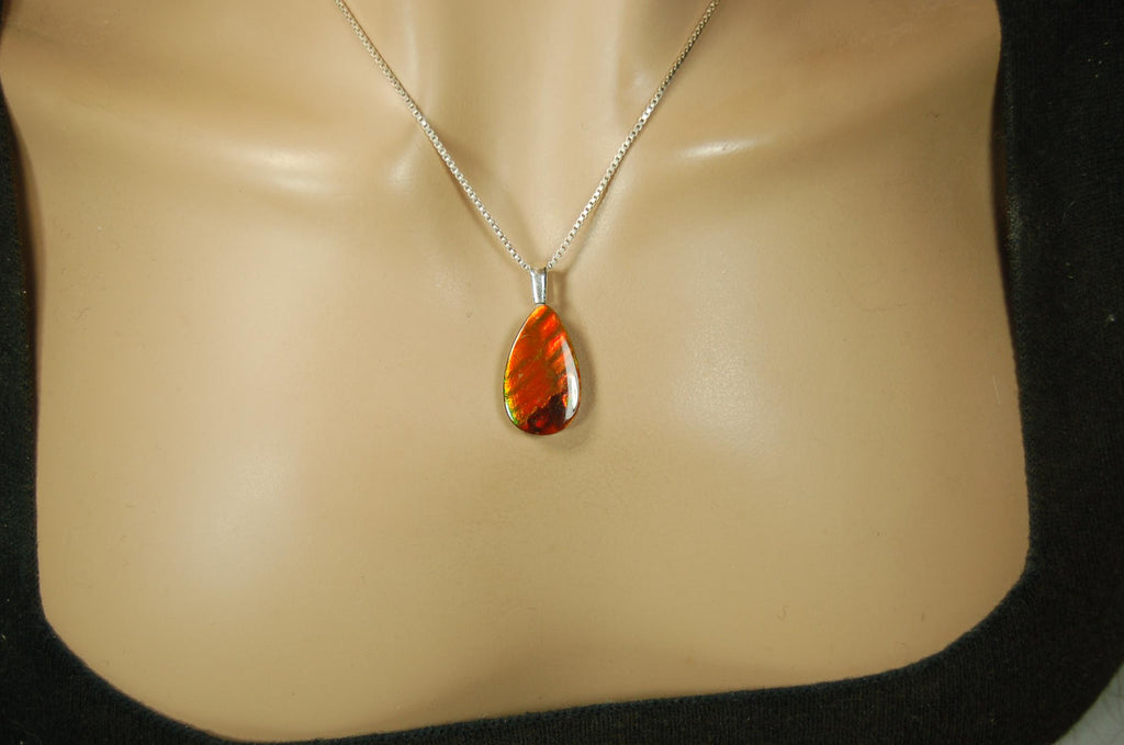 Anniversary gift idea.Unisex Jewelry.Ammolite Pendant Necklace, Sterling Silver Feather Bail. Color changing natural freeform cabochon.