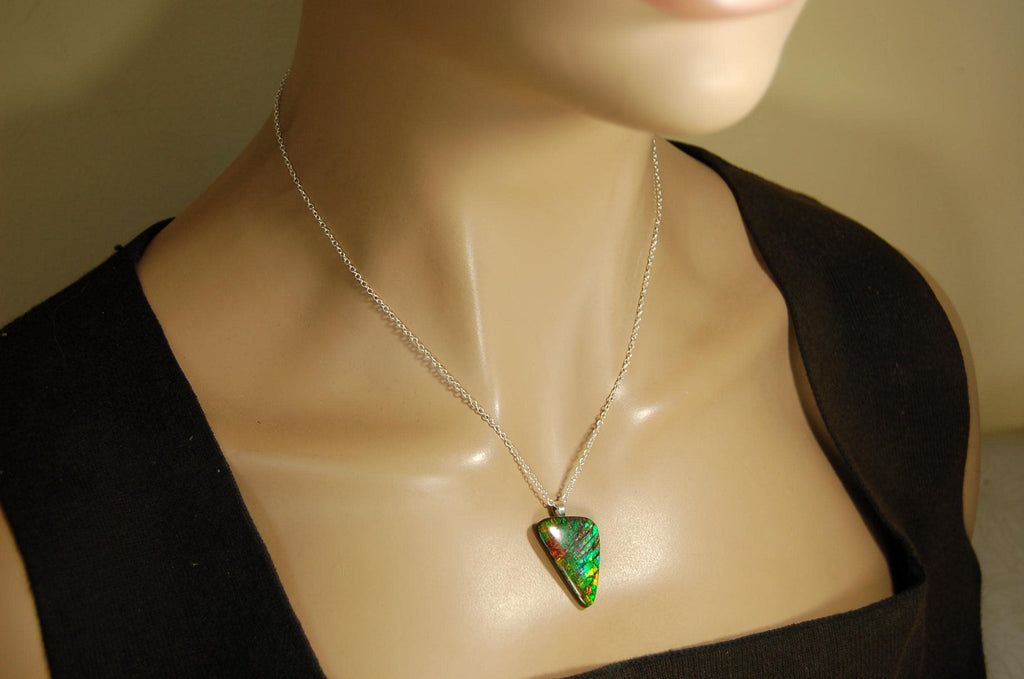 Natural Ammolite Gemstone Pendant from Alberta Canada with bright rich varied colors. A perfect Unisex  birthday gift. 032416