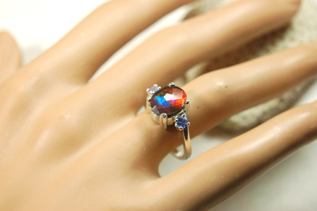 Ammolite Jewelry Ring with Tanzanites.No import taxes under CUSMA rules.022414