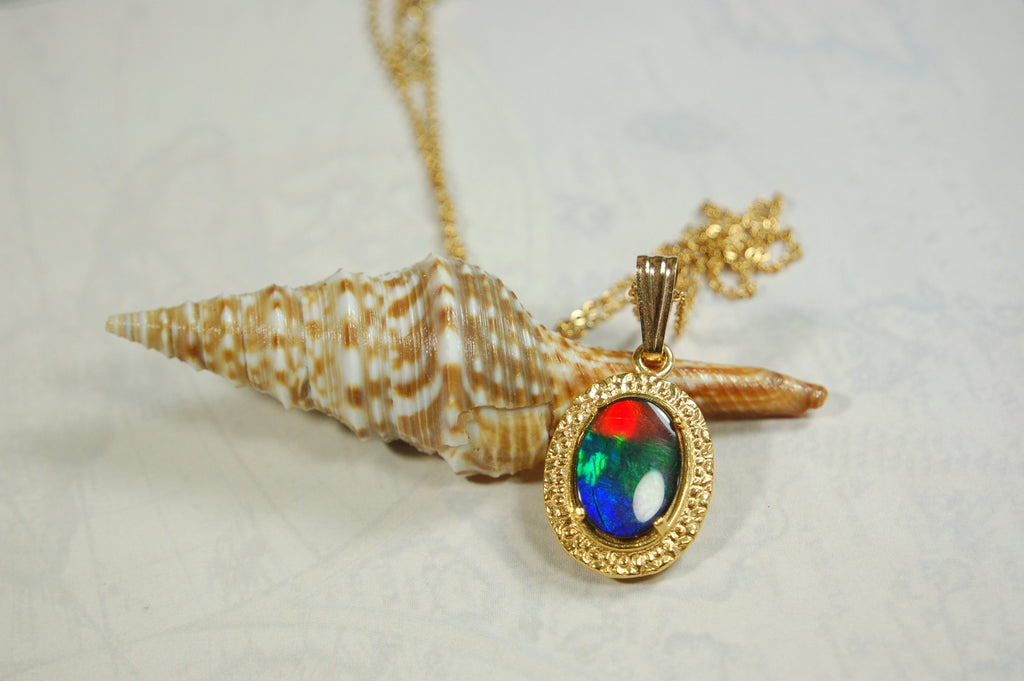 Ammolite.Gorgeous Alberta Ammolite Pendant in 14k Gold filled.The perfect birthday/anniversary gift for her.010424