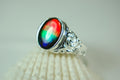 Ammolite Mens Ring.Size 12.Brilliant tricolor gem with rich deep changing colors.Solid sterling setting.011115