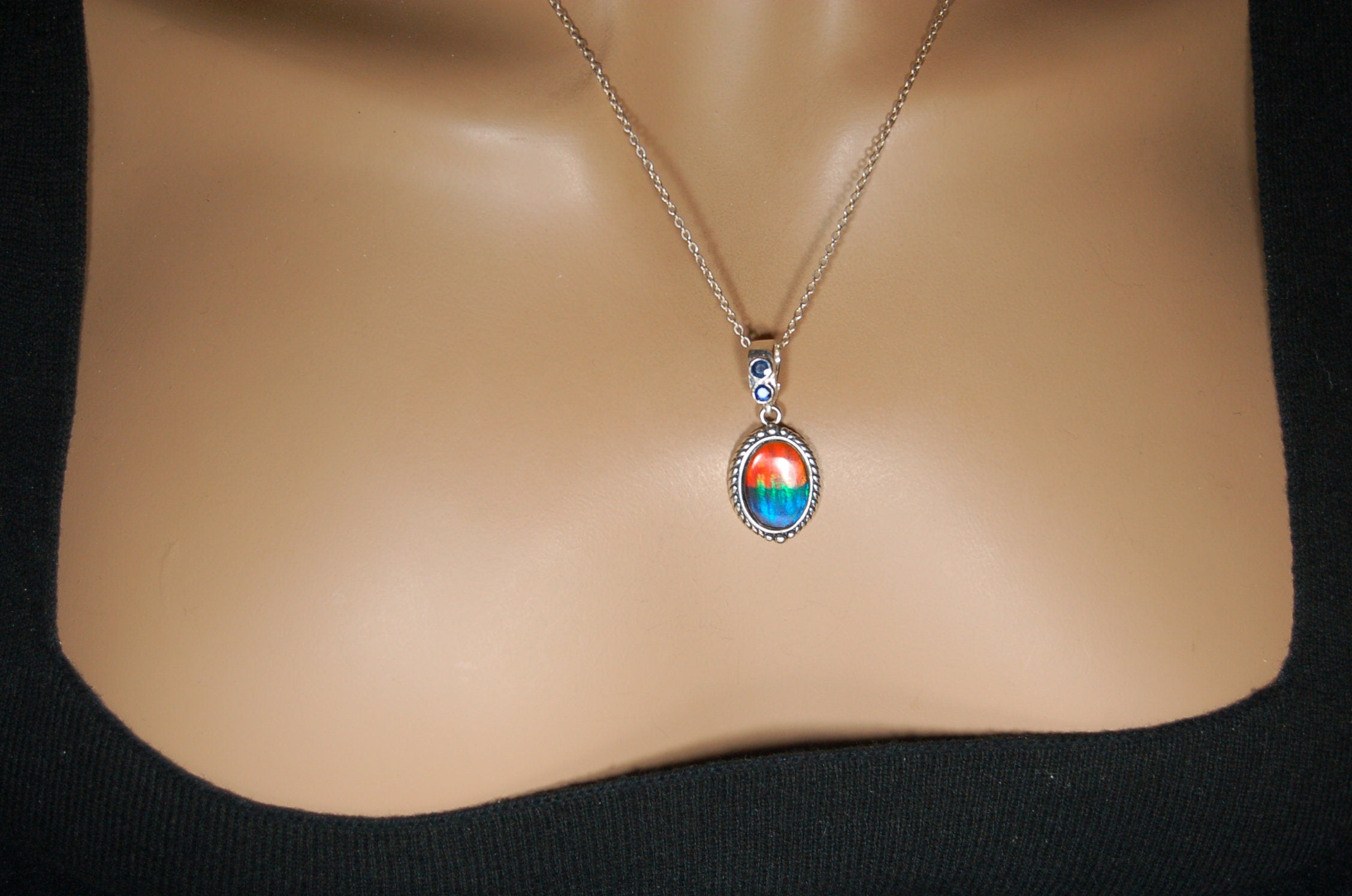 Ammolite Pendant Necklace.Solid sterling silver setting.Bright Rainbow colors. Sapphire studded bail.Unique gift for wife.102429