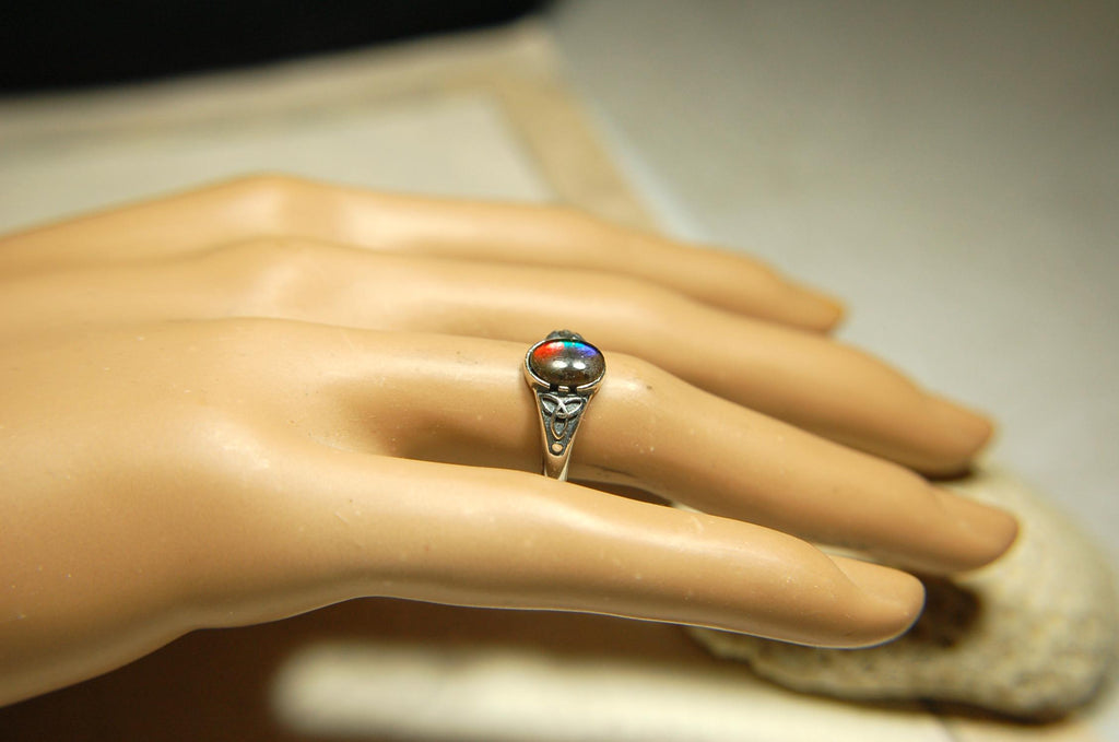 Ammolite Ladies Ring.Sterling Silver.Very feminine, has Celtic design and is in your size too!Brilliant tricolor gem.Gift for her?030816
