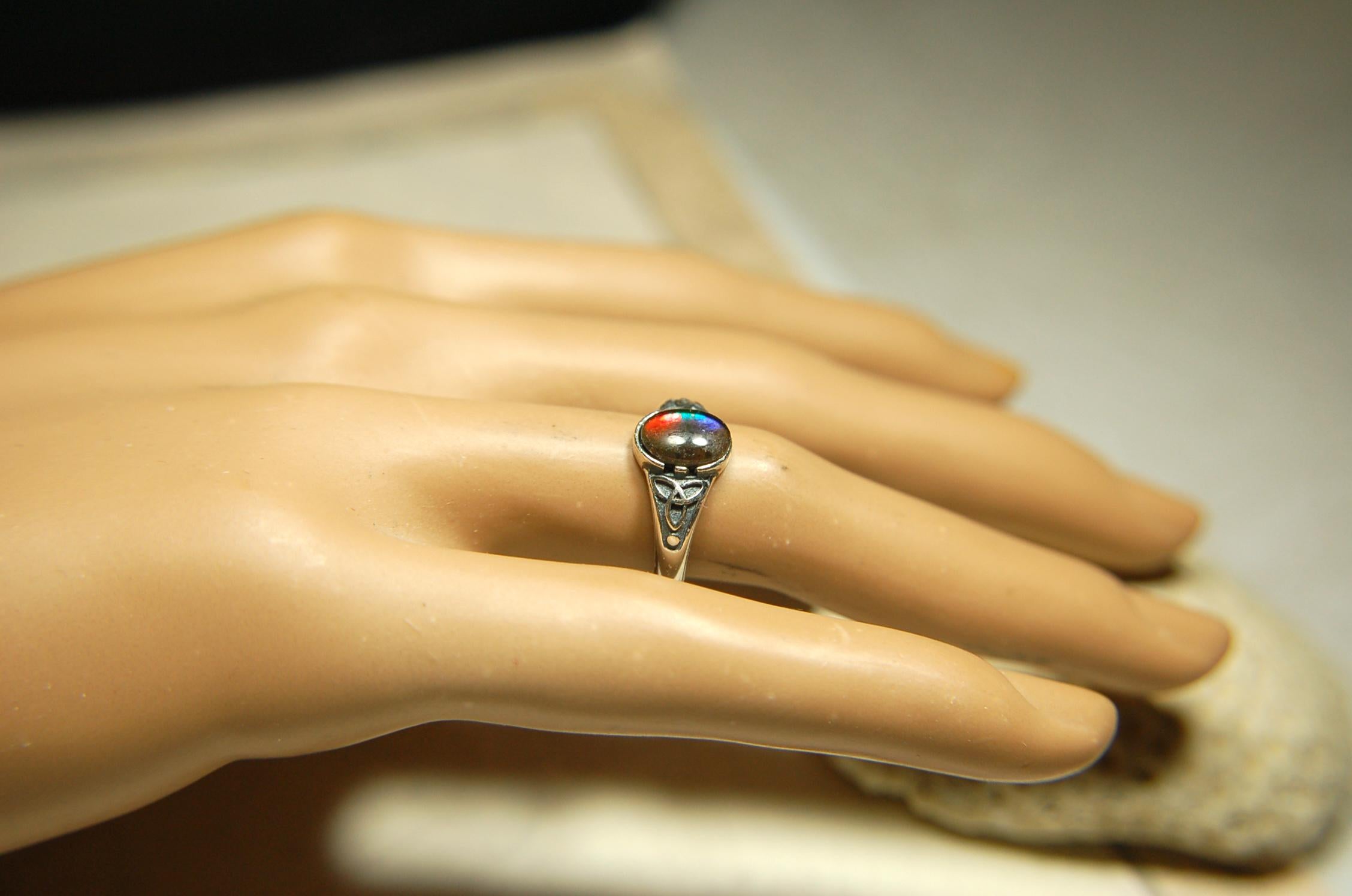 Ammolite Ladies Ring.Sterling Silver.Very feminine, has Celtic design and is in your size too!Brilliant tricolor gem.Gift for her?030816