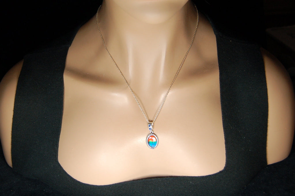 Ammolite Pendant Necklace.Solid sterling silver setting.Bright Rainbow colors. Sapphire studded bail.Unique gift for wife.102429