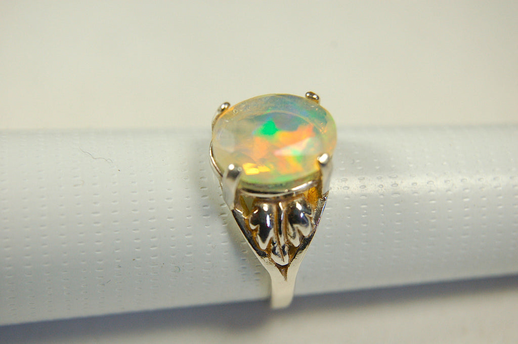 Opal ring.Bright Faceted Natural gem.Lovely flashing colors.#102612